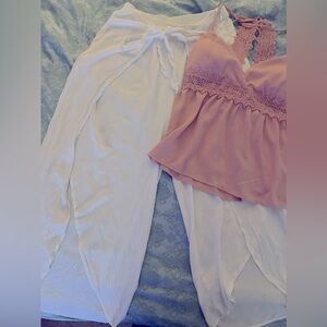 A Beautiful combination of white flowing pants and a beautiful flowing mauve top